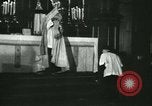 Image of priest performs religious ceremony United States USA, 1934, second 34 stock footage video 65675022430
