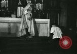 Image of priest performs religious ceremony United States USA, 1934, second 35 stock footage video 65675022430
