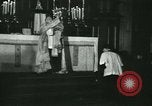 Image of priest performs religious ceremony United States USA, 1934, second 36 stock footage video 65675022430