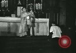 Image of priest performs religious ceremony United States USA, 1934, second 38 stock footage video 65675022430