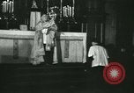 Image of priest performs religious ceremony United States USA, 1934, second 41 stock footage video 65675022430