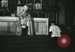 Image of priest performs religious ceremony United States USA, 1934, second 42 stock footage video 65675022430