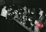 Image of priest performs religious ceremony United States USA, 1934, second 49 stock footage video 65675022430