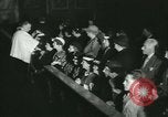 Image of priest performs religious ceremony United States USA, 1934, second 50 stock footage video 65675022430