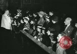 Image of priest performs religious ceremony United States USA, 1934, second 51 stock footage video 65675022430