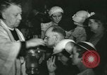 Image of priest performs religious ceremony United States USA, 1934, second 59 stock footage video 65675022430