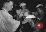 Image of priest performs religious ceremony United States USA, 1934, second 60 stock footage video 65675022430