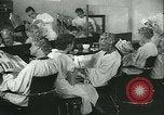 Standbild Hairstylist Fernand Paris Frankreich, 1934, aus Sekunde 21 historischem Filmmaterial Videoclip 65675022435
