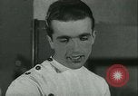 Standbild Hairstylist Fernand Paris Frankreich, 1934, aus Sekunde 28 historischem Filmmaterial Videoclip 65675022435