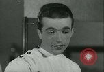 Standbild Hairstylist Fernand Paris Frankreich, 1934, aus Sekunde 30 historischem Filmmaterial Videoclip 65675022435