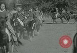 Standbild junge Kinder reiten Pferde Kansas City Missouri USA, 1934, aus Sekunde 18 historischem Filmmaterial Videoclip 65675022443
