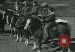 Standbild junge Kinder reiten Pferde Kansas City Missouri USA, 1934, aus Sekunde 21 historischem Filmmaterial Videoclip 65675022443