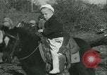 Standbild junge Kinder reiten Pferde Kansas City Missouri USA, 1934, aus Sekunde 23 historischem Filmmaterial Videoclip 65675022443