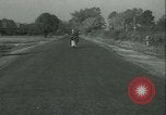 Standbild Motorroller United States USA, 1933, aus Sekunde 26 historischem Filmmaterial Videoclip 65675022493