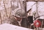 Standbild Vietcong Angriff Saigon Vietnam, 1968, aus Sekunde 57 historischem Filmmaterial Videoclip 65675022568
