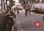 Standbild Vietcong Angriff Saigon Vietnam, 1968, aus Sekunde 48 historischem Filmmaterial Videoclip 65675022569