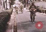 Standbild Vietcong Angriff Saigon Vietnam, 1968, aus Sekunde 54 historischem Filmmaterial Videoclip 65675022569