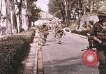 Standbild Vietcong Angriff Saigon Vietnam, 1968, aus Sekunde 57 historischem Filmmaterial Videoclip 65675022569