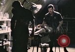 Image of wounded United States soldier Vietnam, 1969, second 4 stock footage video 65675022607