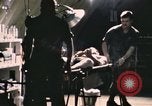 Image of wounded United States soldier Vietnam, 1969, second 5 stock footage video 65675022607