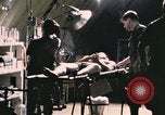 Image of wounded United States soldier Vietnam, 1969, second 7 stock footage video 65675022607