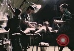 Image of wounded United States soldier Vietnam, 1969, second 10 stock footage video 65675022607