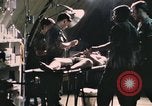 Image of wounded United States soldier Vietnam, 1969, second 26 stock footage video 65675022607