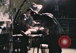 Image of wounded United States soldier Vietnam, 1969, second 37 stock footage video 65675022607