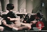 Image of wounded United States soldier Vietnam, 1969, second 48 stock footage video 65675022607