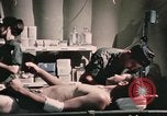 Image of wounded United States soldier Vietnam, 1969, second 49 stock footage video 65675022607
