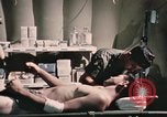 Image of wounded United States soldier Vietnam, 1969, second 50 stock footage video 65675022607