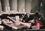 Image of wounded United States soldier Vietnam, 1969, second 51 stock footage video 65675022607