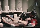 Image of wounded United States soldier Vietnam, 1969, second 53 stock footage video 65675022607