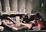Image of wounded United States soldier Vietnam, 1969, second 59 stock footage video 65675022607