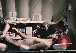 Image of wounded United States soldier Vietnam, 1969, second 60 stock footage video 65675022607