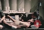 Image of wounded United States soldier Vietnam, 1969, second 61 stock footage video 65675022607