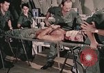 Image of wounded United States soldier Vietnam, 1969, second 6 stock footage video 65675022608