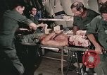 Image of wounded United States soldier Vietnam, 1969, second 8 stock footage video 65675022608