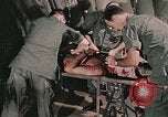 Image of wounded United States soldier Vietnam, 1969, second 9 stock footage video 65675022608