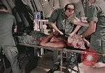 Image of wounded United States soldier Vietnam, 1969, second 11 stock footage video 65675022608