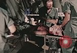 Image of wounded United States soldier Vietnam, 1969, second 12 stock footage video 65675022608
