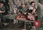 Image of wounded United States soldier Vietnam, 1969, second 14 stock footage video 65675022608