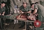 Image of wounded United States soldier Vietnam, 1969, second 16 stock footage video 65675022608