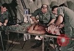 Image of wounded United States soldier Vietnam, 1969, second 17 stock footage video 65675022608