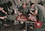 Image of wounded United States soldier Vietnam, 1969, second 19 stock footage video 65675022608