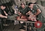 Image of wounded United States soldier Vietnam, 1969, second 20 stock footage video 65675022608