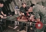 Image of wounded United States soldier Vietnam, 1969, second 22 stock footage video 65675022608
