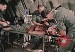 Image of wounded United States soldier Vietnam, 1969, second 23 stock footage video 65675022608