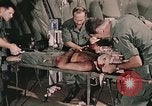 Image of wounded United States soldier Vietnam, 1969, second 24 stock footage video 65675022608