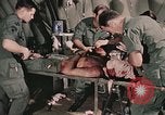 Image of wounded United States soldier Vietnam, 1969, second 26 stock footage video 65675022608